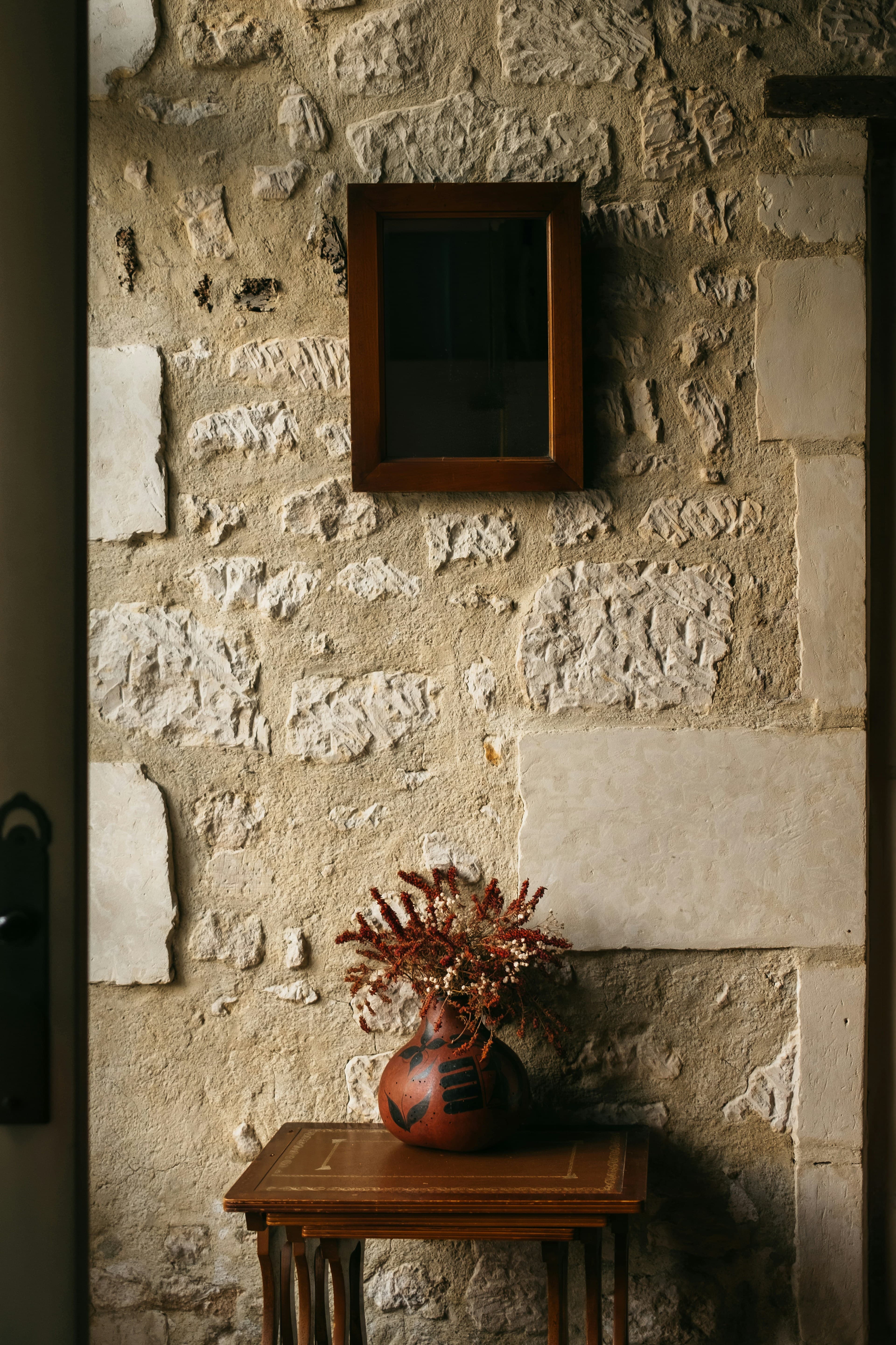 Raw stone interior wall, natural light